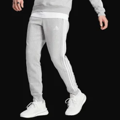Essentials Fleece 3-Stripes Tapered Cuff Joggers, miesten collegehousut - Vapaa-Ajan Housut - Essentials Fleece 3-Stripes Tapered Cuff Joggers, miesten collegehousut